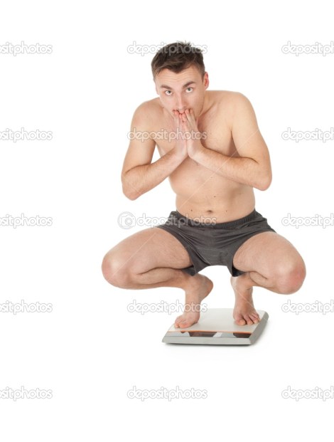 depositphotos_6562236-Young-man-on-scale